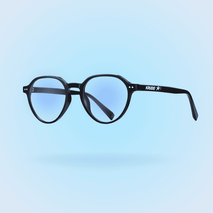 Gafas Krudo All In con filtro de luz azul y montura negra redonda, diseño elegante y protector para reducir la fatiga visual y mejorar la concentración durante el uso de pantallas.