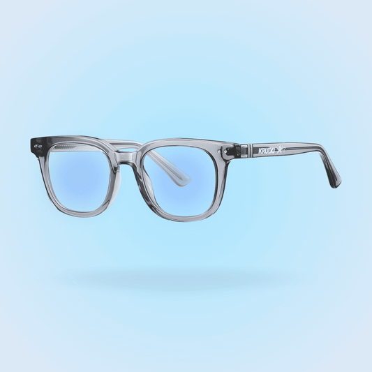 Gafas Krudo No Days Off con filtro de luz azul y montura gris transparente, diseño moderno y ligero para reducir la fatiga visual mientras trabajas o estudias frente a pantallas.